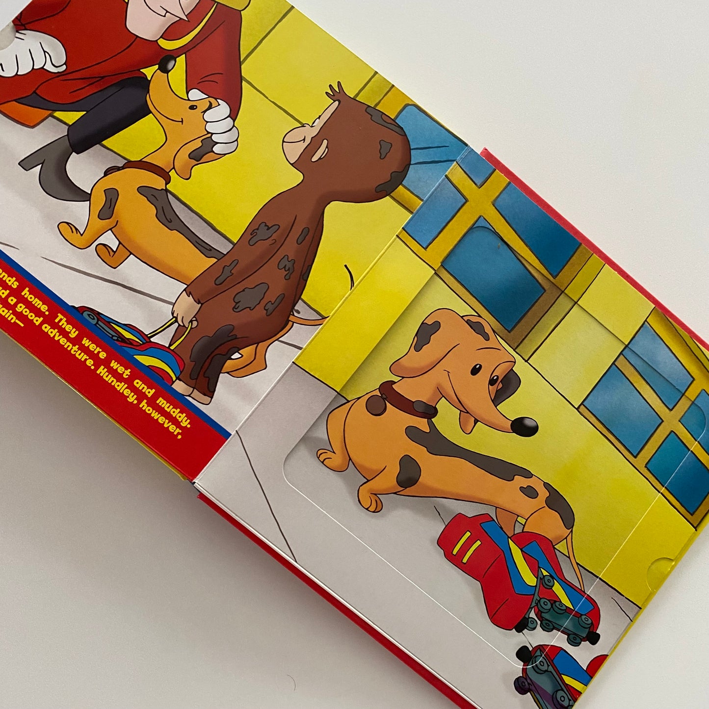 Curious George To The Rescue Slide & Peek Board Book
