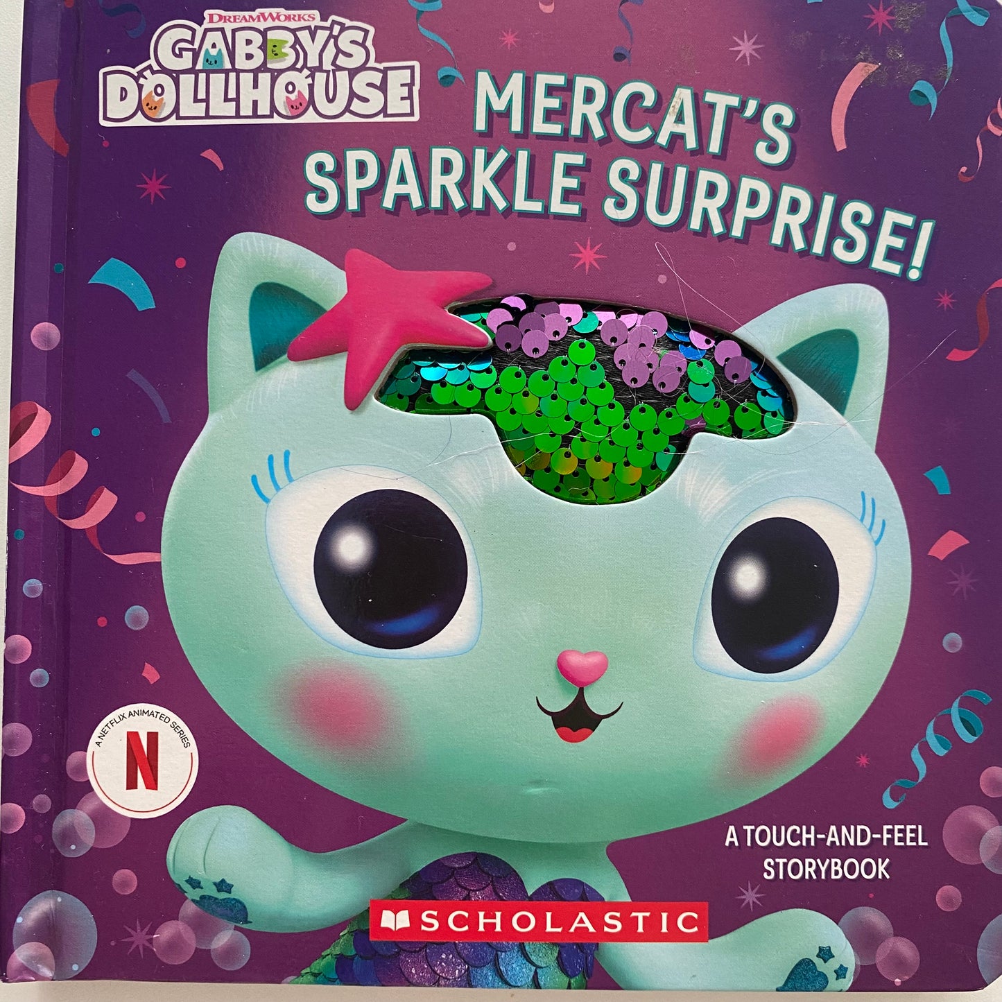 Gabby’s Dollhouse Mercat’s Sparkle Surprise Touch & Feel Book