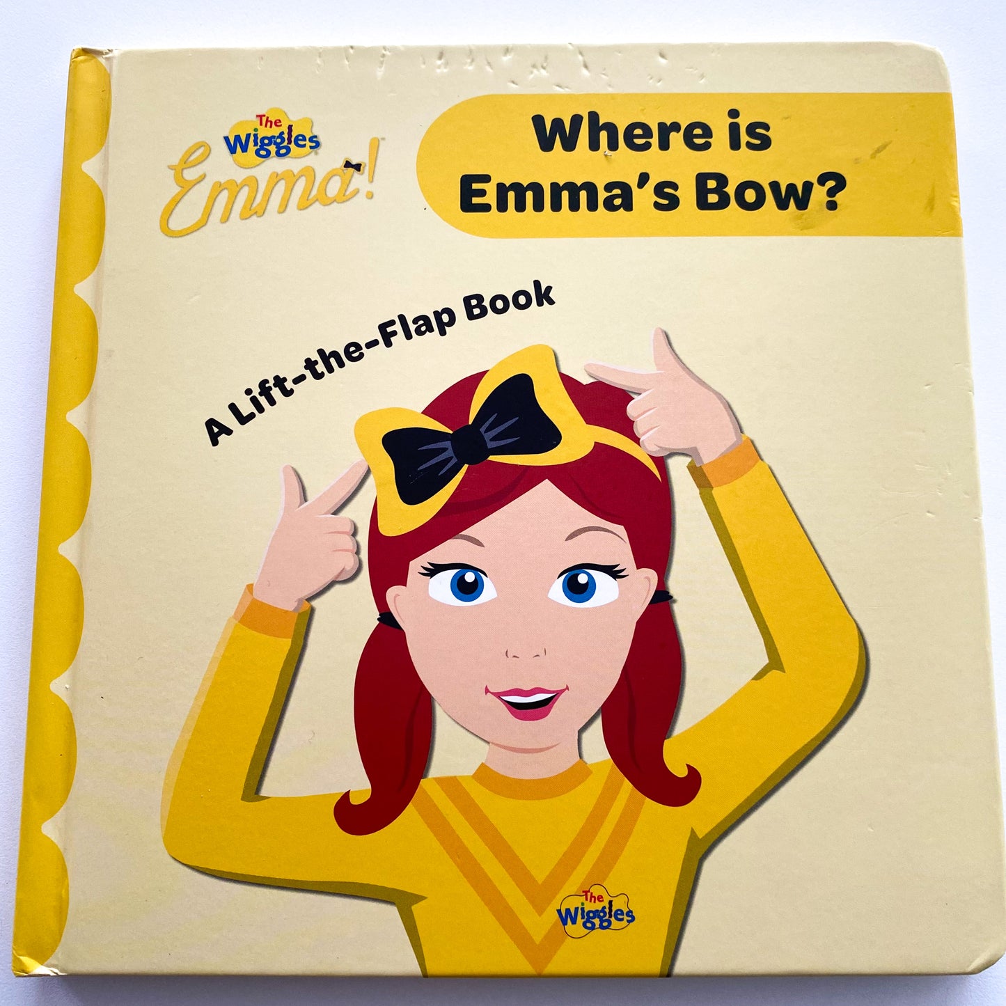 The Wiggles Where Is Emma’s Bow? Lift The Flap Board Book